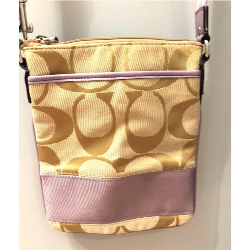 Tan and lavender Coach crossbody purse